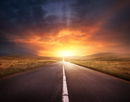 Road Leading Into A Sunset